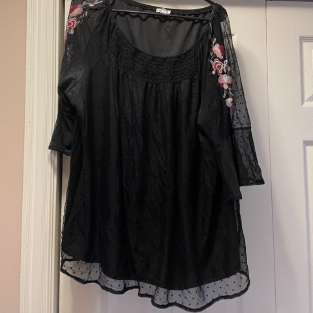 Black top with sheer sleeves
